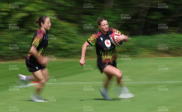 130526 - Wales Women Rugby Training - Amy Williams with Jasmine Joyce during a rugby training session ahead of their final Women’s 6 Nations match against Italy
