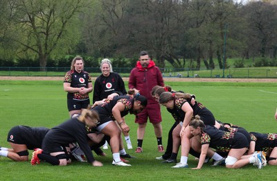 140426 - Wales Women Rugby Training - The forwards scrum down during a rugby training session ahead of the Women’s 6 Nations match against France
