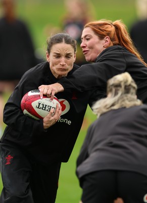 140426 - Wales Women Rugby Training - Jasmine Joyce and Georgia Evans during a rugby training session ahead of the Women’s 6 Nations match against France