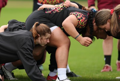 140426 - Wales Women Rugby Training - Kate looks on as the Wales forwards scrum down during a rugby training session ahead of the Women’s 6 Nations match against France