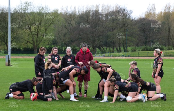 140426 - Wales Women Rugby Training - The forwards scrum down during a rugby training session ahead of the Women’s 6 Nations match against France