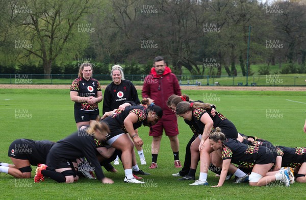 140426 - Wales Women Rugby Training - The forwards scrum down during a rugby training session ahead of the Women’s 6 Nations match against France