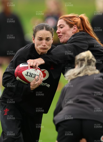 140426 - Wales Women Rugby Training - Jasmine Joyce and Georgia Evans during a rugby training session ahead of the Women’s 6 Nations match against France