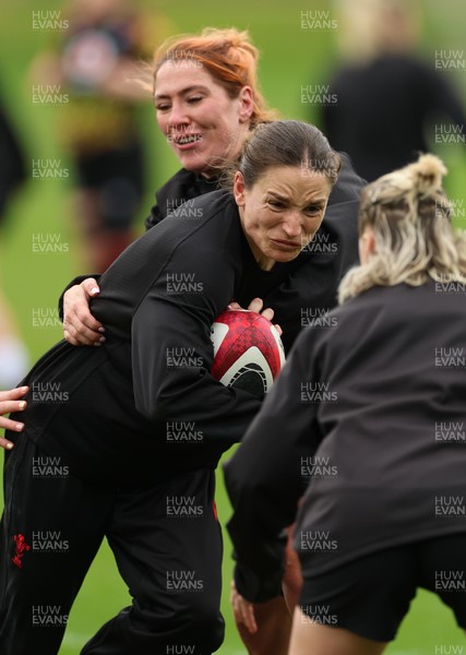 140426 - Wales Women Rugby Training - Jasmine Joyce and Georgia Evans during a rugby training session ahead of the Women’s 6 Nations match against France