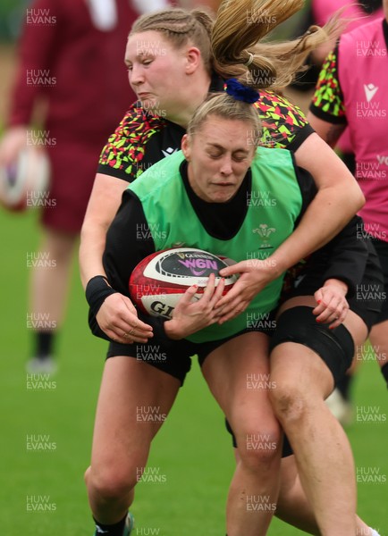 140426 - Wales Women Rugby Training - Hannah Dallavalle and Alaw Pyrs during a rugby training session ahead of the Women’s 6 Nations match against France