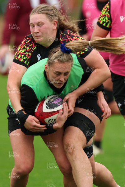 140426 - Wales Women Rugby Training - Hannah Dallavalle and Alaw Pyrs during a rugby training session ahead of the Women’s 6 Nations match against France