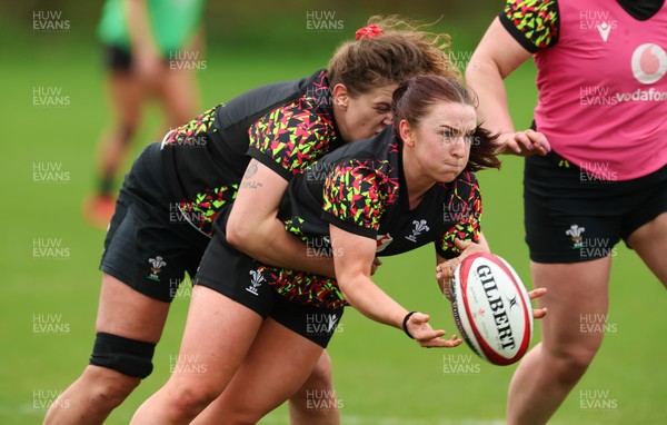 140426 - Wales Women Rugby Training - Sian Jones is tackled by Natalia John during a rugby training session ahead of the Women’s 6 Nations match against France