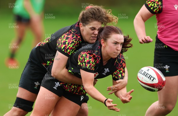 140426 - Wales Women Rugby Training - Sian Jones is tackled by Natalia John during a rugby training session ahead of the Women’s 6 Nations match against France