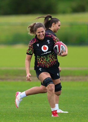 140526 - Wales Women Rugby Training - Natalia John warms up during a rugby training session ahead of their final Women’s 6 Nations match against Italy