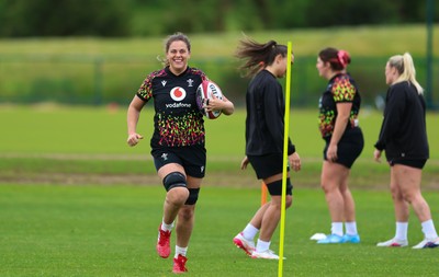 140526 - Wales Women Rugby Training - Natalia John warms up during a rugby training session ahead of their final Women’s 6 Nations match against Italy