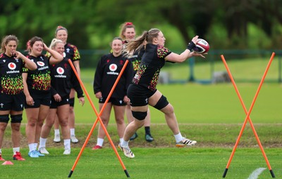 140526 - Wales Women Rugby Training - Alaw Pyrs warms up during a rugby training session ahead of their final Women’s 6 Nations match against Italy