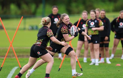 140526 - Wales Women Rugby Training - Alaw Pyrs warms up during a rugby training session ahead of their final Women’s 6 Nations match against Italy