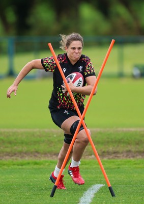 140526 - Wales Women Rugby Training - Natalia John warms up during a rugby training session ahead of their final Women’s 6 Nations match against Italy