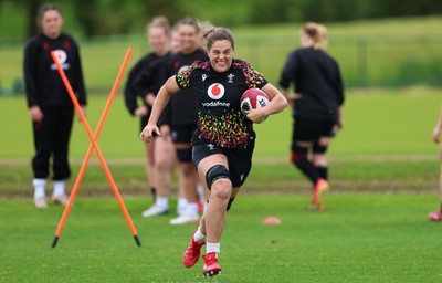 140526 - Wales Women Rugby Training - Natalia John warms up during a rugby training session ahead of their final Women’s 6 Nations match against Italy