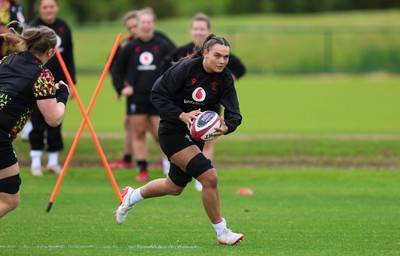 140526 - Wales Women Rugby Training - Bryonie King warms up during a rugby training session ahead of their final Women’s 6 Nations match against Italy