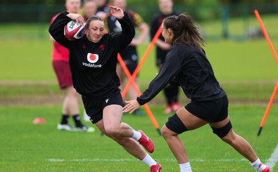 140526 - Wales Women Rugby Training - Kendall Waudby warms up during a rugby training session ahead of their final Women’s 6 Nations match against Italy