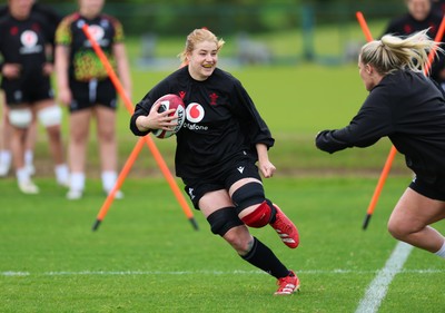 140526 - Wales Women Rugby Training - Bethan Lewis warms up during a rugby training session ahead of their final Women’s 6 Nations match against Italy