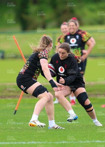 140526 - Wales Women Rugby Training - Jenni Scoble warms up during a rugby training session ahead of their final Women’s 6 Nations match against Italy