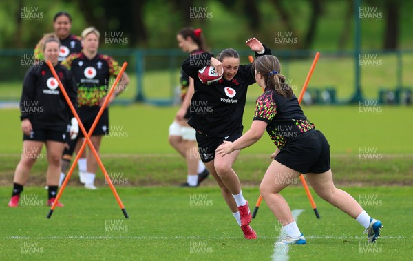 140526 - Wales Women Rugby Training - Kendall Waudby warms up during a rugby training session ahead of their final Women’s 6 Nations match against Italy