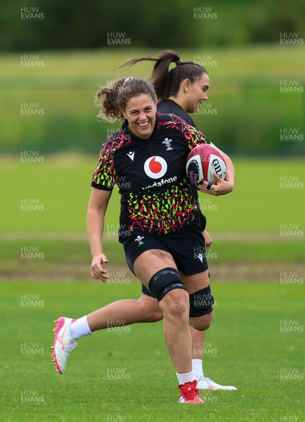 140526 - Wales Women Rugby Training - Natalia John warms up during a rugby training session ahead of their final Women’s 6 Nations match against Italy