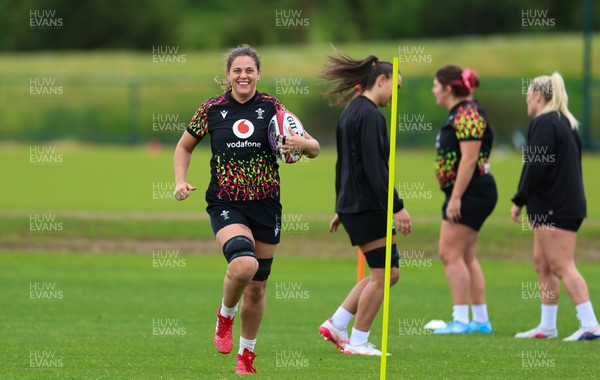 140526 - Wales Women Rugby Training - Natalia John warms up during a rugby training session ahead of their final Women’s 6 Nations match against Italy
