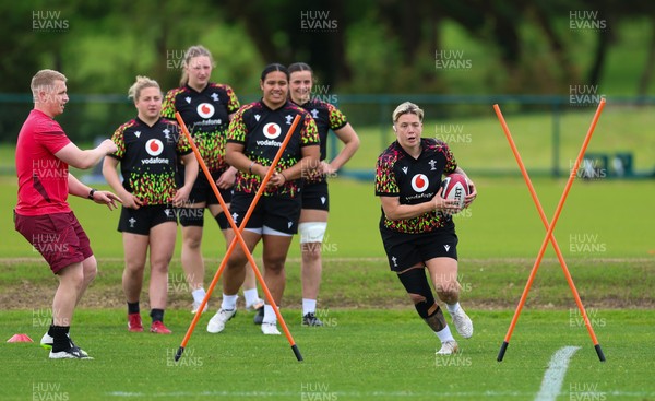 140526 - Wales Women Rugby Training - Donna Rose warms up during a rugby training session ahead of their final Women’s 6 Nations match against Italy
