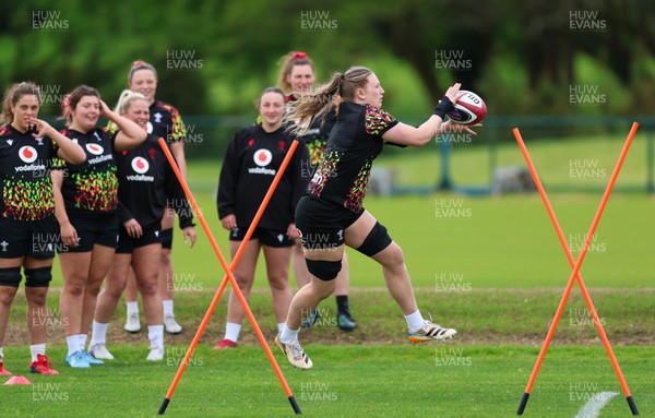 140526 - Wales Women Rugby Training - Alaw Pyrs warms up during a rugby training session ahead of their final Women’s 6 Nations match against Italy