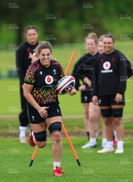 140526 - Wales Women Rugby Training - Natalia John warms up during a rugby training session ahead of their final Women’s 6 Nations match against Italy