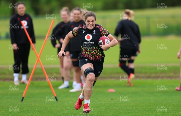 140526 - Wales Women Rugby Training - Natalia John warms up during a rugby training session ahead of their final Women’s 6 Nations match against Italy