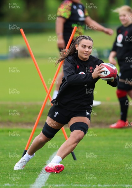 140526 - Wales Women Rugby Training - Bryonie King warms up during a rugby training session ahead of their final Women’s 6 Nations match against Italy