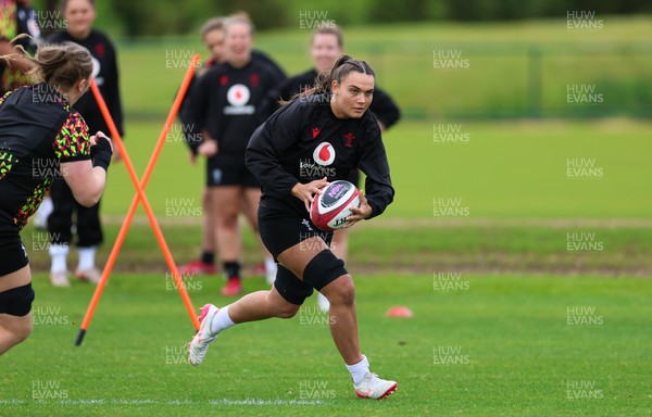 140526 - Wales Women Rugby Training - Bryonie King warms up during a rugby training session ahead of their final Women’s 6 Nations match against Italy