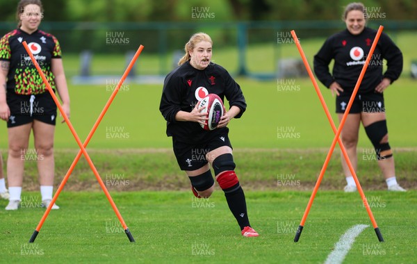140526 - Wales Women Rugby Training - Bethan Lewis warms up during a rugby training session ahead of their final Women’s 6 Nations match against Italy