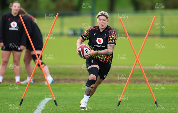 140526 - Wales Women Rugby Training - Donna Rose warms up during a rugby training session ahead of their final Women’s 6 Nations match against Italy