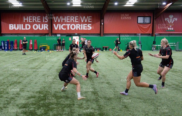 140923 - Wales Women Rugby Training Session - Jazz Joyce passes to Lowri Norkett during training session