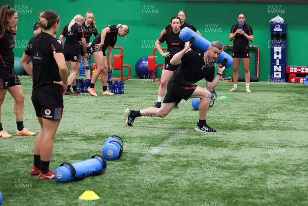 140923 - Wales Women Rugby Training Session - Eifion Roberts leads the session during training 