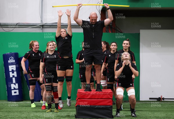 140923 - Wales Women Rugby Training Session - Alisha Butchers and Alex Callender work with Mike Hill during training session