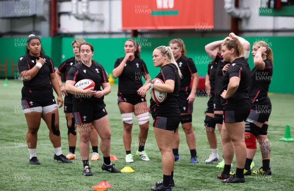 140923 - Wales Women Rugby Training Session - The forwards gather together during training session
