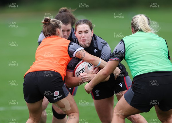 140923 - Wales Women Rugby Training Session - Kat Evans with Abbey Constable in support during training session