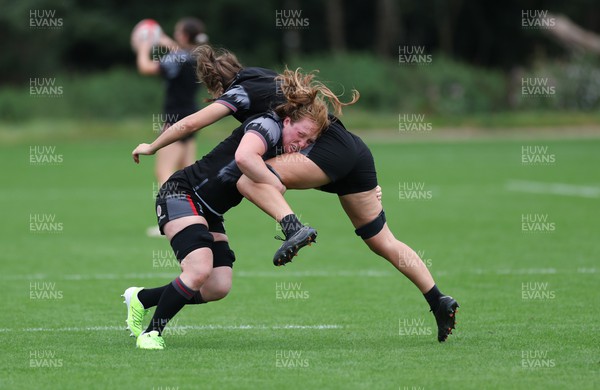 140923 - Wales Women Rugby Training Session - Abbie Fleming drives into Bryonie King during training session
