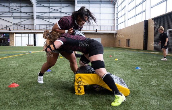 141023 - Wales Women Training Session -  Sisilia Tuipulotu and Abbie Fleming during a rugby training session at the NZCIS in Wellington