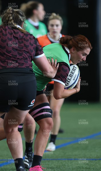141023 - Wales Women Training Session -  Georgia Evans looks to break during a rugby training session at the NZCIS in Wellington
