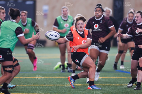141023 - Wales Women Training Session -  Lleucu George passes during a rugby training session at the NZCIS in Wellington