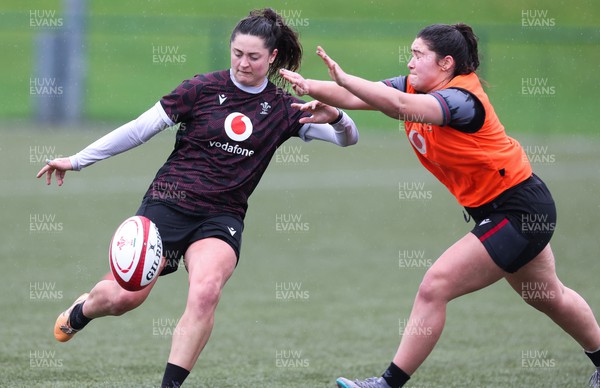 150224 - Wales Women Extended Squad Training session - Robyn Wilkins is challenged by Gwennan Hopkins during training session as preparations get under way for the Women’s 6 Nations