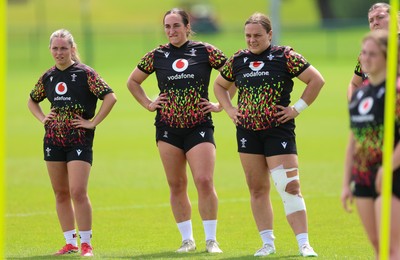 150626 - Wales Women Rugby Training Session - Hanna Marshall, Courtney Keight and Jenni Scoble during a training session ahead of the match against The Barbarians at the Allianz Stadium