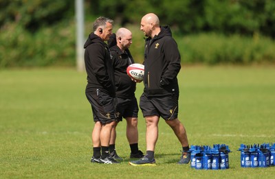 150725 - Wales Women Rugby training - Shaun Connor, Wales Women attack coach, Sean Lynn, Wales Women head coach, and Mike Hill, Wales Women forwards coach during a training session ahead of their two match tour against Australia