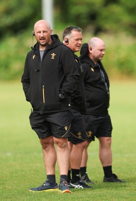 150725 - Wales Women Rugby training - Mike Hill, Wales Women forwards coach, Shaun Connor, Wales Women attack coach and Sean Lynn, Wales Women head coach, during a training session ahead of their two match tour against Australia