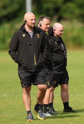 150725 - Wales Women Rugby training - Mike Hill, Wales Women forwards coach, Shaun Connor, Wales Women attack coach and Sean Lynn, Wales Women head coach, during a training session ahead of their two match tour against Australia