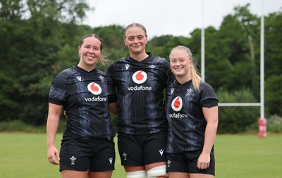 150725 - Wales Women Rugby training - Katherine Baverstock, Tilly Vucaj and Seren Lockwood during a training session ahead of their two match tour against Australia