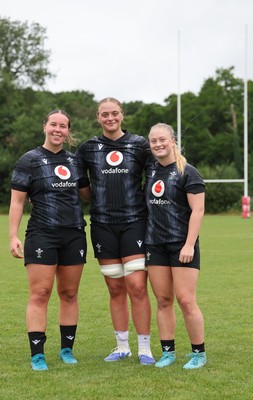 150725 - Wales Women Rugby training - Katherine Baverstock, Tilly Vucaj and Seren Lockwood during a training session ahead of their two match tour against Australia