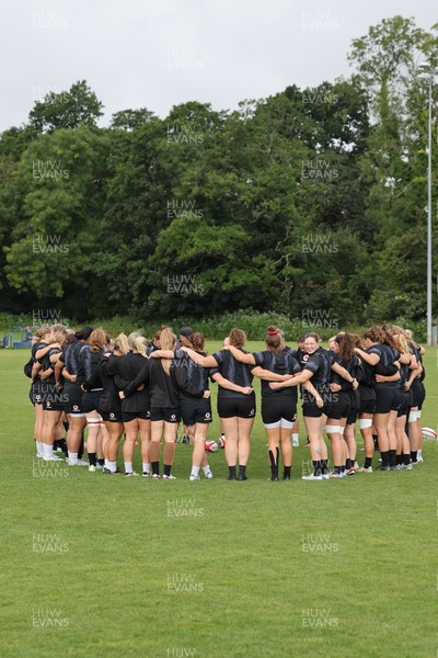 150725 - Wales Women Rugby training - The Wales Women’s squad huddle up during a training session ahead of their two match tour against Australia